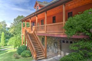 Stairs-to-Wraparound-Deck-from-Driveway-and-Garage